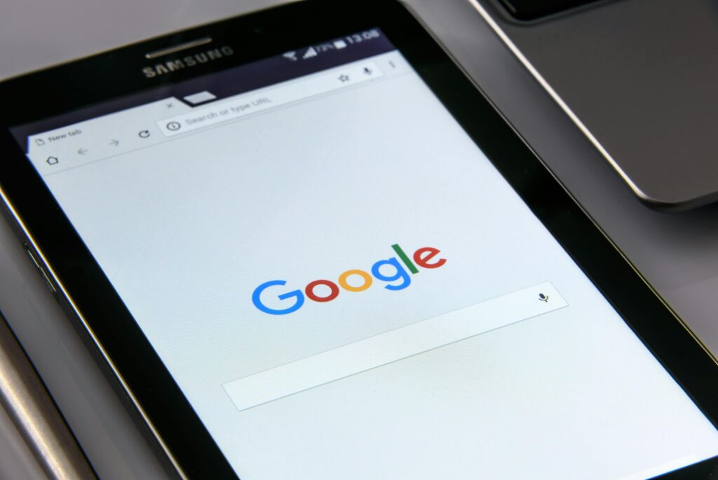 pexels-photo-218717-218717 Close-up of a tablet displaying Google's search screen, emphasizing technology and internet browsing.